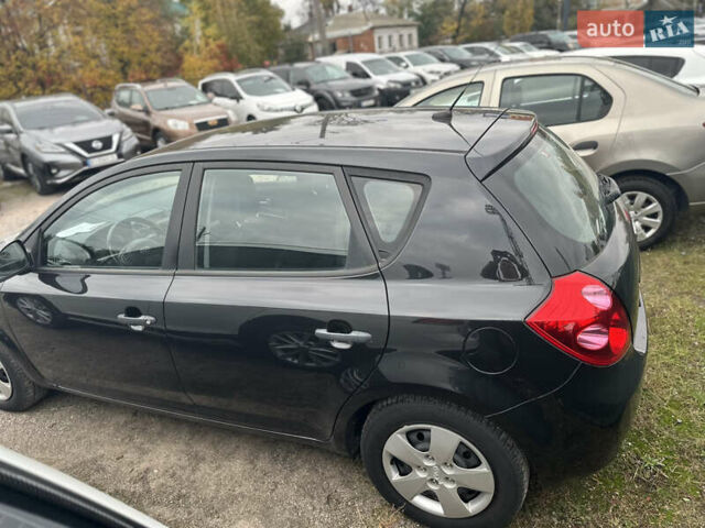 Черный Киа Сид, объемом двигателя 1.4 л и пробегом 161 тыс. км за 5500 $, фото 14 на Automoto.ua