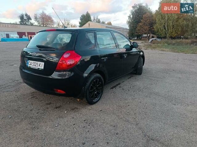 Чорний Кіа Сід, об'ємом двигуна 1.4 л та пробігом 330 тис. км за 3950 $, фото 3 на Automoto.ua