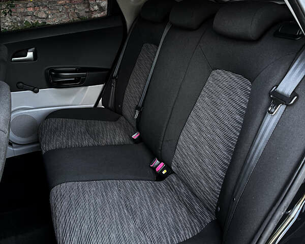 Черный Киа Сид, объемом двигателя 1.4 л и пробегом 219 тыс. км за 5800 $, фото 29 на Automoto.ua