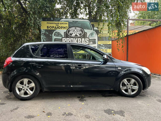 Черный Киа Сид, объемом двигателя 2 л и пробегом 224 тыс. км за 6300 $, фото 1 на Automoto.ua