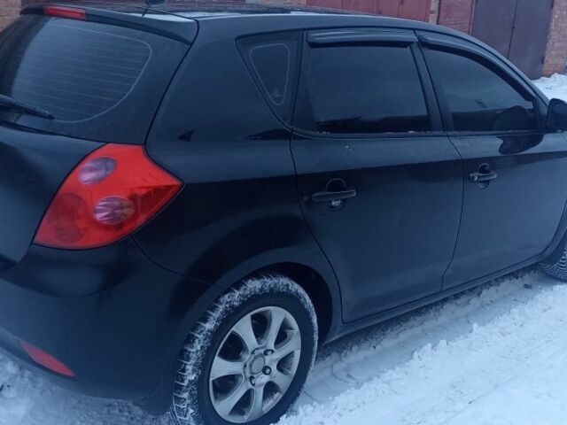 Чорний Кіа Сід, об'ємом двигуна 1.6 л та пробігом 214 тис. км за 5500 $, фото 4 на Automoto.ua
