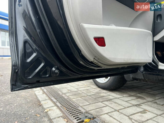 Черный Киа Сид, объемом двигателя 2 л и пробегом 188 тыс. км за 6000 $, фото 18 на Automoto.ua