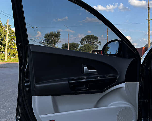 Черный Киа Сид, объемом двигателя 1.4 л и пробегом 219 тыс. км за 5800 $, фото 25 на Automoto.ua