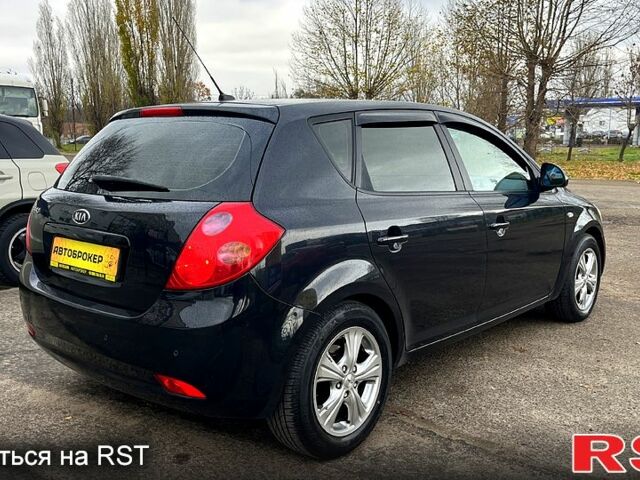 Чорний Кіа Сід, об'ємом двигуна 1.6 л та пробігом 310 тис. км за 5990 $, фото 3 на Automoto.ua