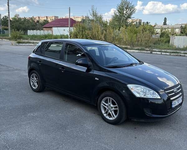 Чорний Кіа Сід, об'ємом двигуна 1.4 л та пробігом 204 тис. км за 4700 $, фото 2 на Automoto.ua