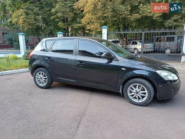 Черный Киа Сид, объемом двигателя 1.4 л и пробегом 250 тыс. км за 5200 $, фото 2 на Automoto.ua
