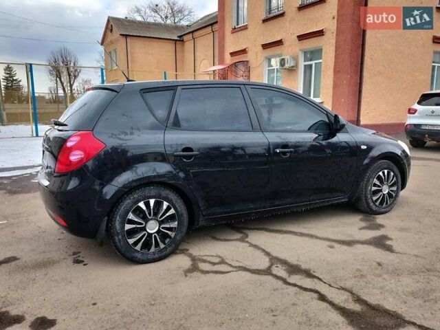 Черный Киа Сид, объемом двигателя 1.6 л и пробегом 47 тыс. км за 6000 $, фото 2 на Automoto.ua