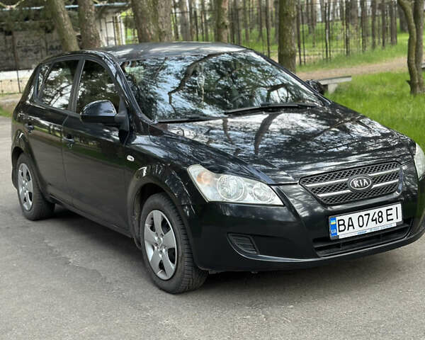 Чорний Кіа Сід, об'ємом двигуна 1.58 л та пробігом 246 тис. км за 5100 $, фото 1 на Automoto.ua