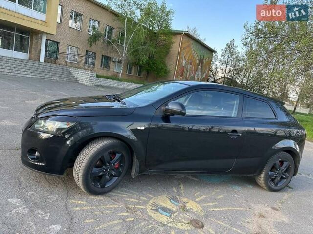 Чорний Кіа Сід, об'ємом двигуна 1.6 л та пробігом 149 тис. км за 5600 $, фото 7 на Automoto.ua