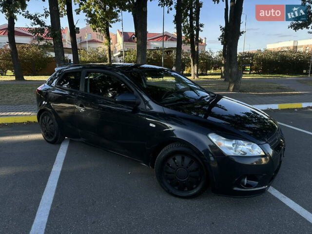 Чорний Кіа Сід, об'ємом двигуна 1.4 л та пробігом 212 тис. км за 4999 $, фото 1 на Automoto.ua