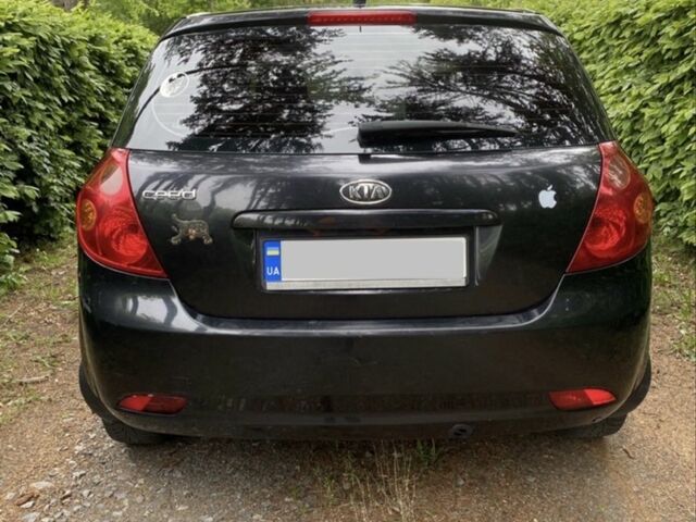 Чорний Кіа Сід, об'ємом двигуна 1.4 л та пробігом 330 тис. км за 4499 $, фото 2 на Automoto.ua