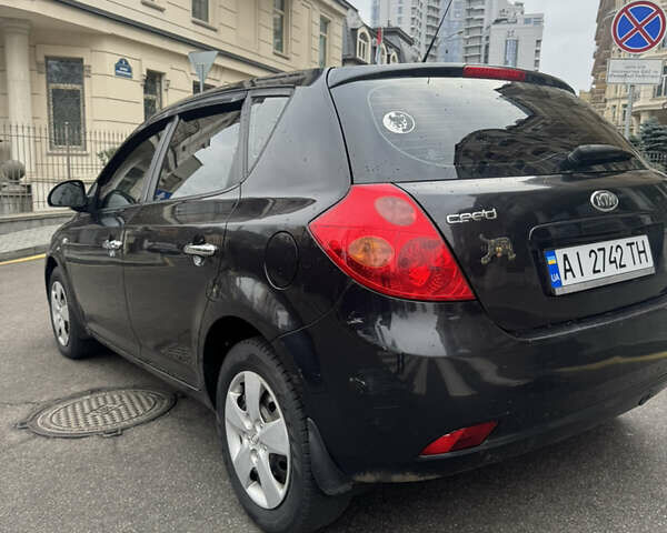 Черный Киа Сид, объемом двигателя 1.4 л и пробегом 334 тыс. км за 3999 $, фото 4 на Automoto.ua