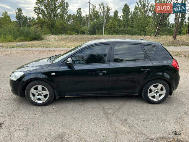Черный Киа Сид, объемом двигателя 1.59 л и пробегом 247 тыс. км за 5800 $, фото 1 на Automoto.ua