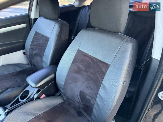 Черный Киа Сид, объемом двигателя 1.6 л и пробегом 190 тыс. км за 4950 $, фото 16 на Automoto.ua