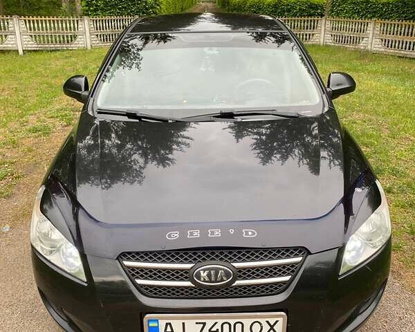 Черный Киа Сид, объемом двигателя 1.4 л и пробегом 330 тыс. км за 4600 $, фото 1 на Automoto.ua