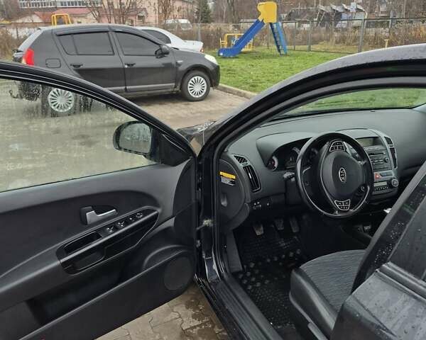 Черный Киа Сид, объемом двигателя 1.6 л и пробегом 221 тыс. км за 5900 $, фото 6 на Automoto.ua
