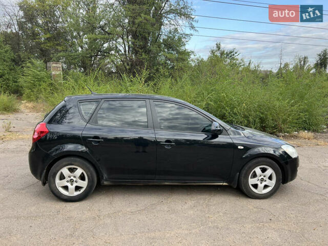 Черный Киа Сид, объемом двигателя 1.59 л и пробегом 247 тыс. км за 5800 $, фото 3 на Automoto.ua