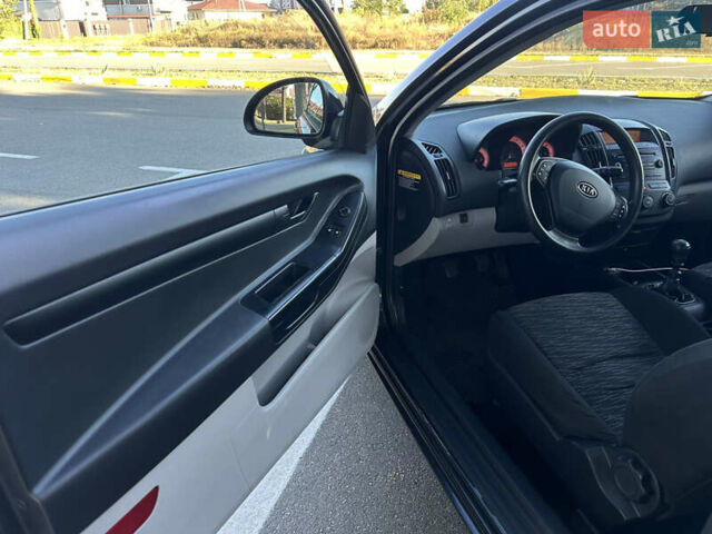 Чорний Кіа Сід, об'ємом двигуна 1.4 л та пробігом 212 тис. км за 4999 $, фото 4 на Automoto.ua