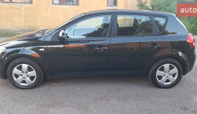 Чорний Кіа Сід, об'ємом двигуна 1.4 л та пробігом 170 тис. км за 5600 $, фото 25 на Automoto.ua