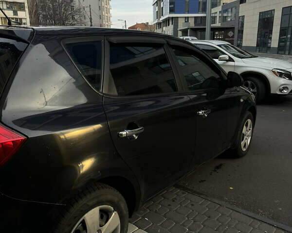 Черный Киа Сид, объемом двигателя 1.4 л и пробегом 334 тыс. км за 4499 $, фото 4 на Automoto.ua