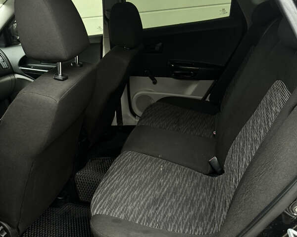 Черный Киа Сид, объемом двигателя 1.4 л и пробегом 334 тыс. км за 4499 $, фото 12 на Automoto.ua