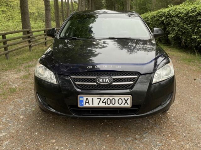 Чорний Кіа Сід, об'ємом двигуна 1.4 л та пробігом 330 тис. км за 4499 $, фото 1 на Automoto.ua