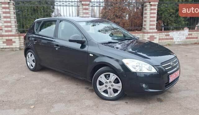 Черный Киа Сид, объемом двигателя 1.6 л и пробегом 220 тыс. км за 5850 $, фото 22 на Automoto.ua