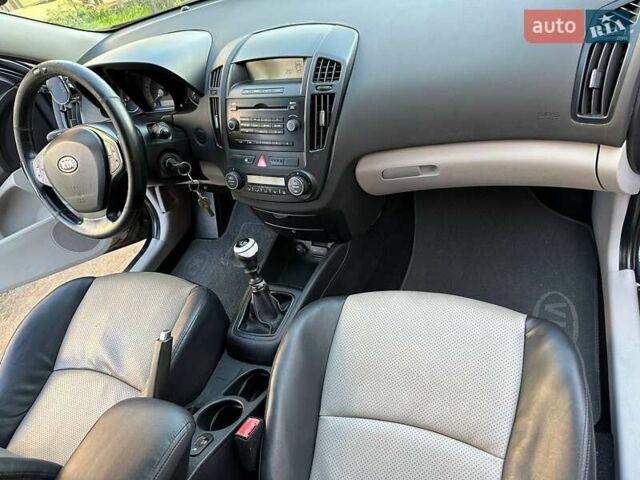 Чорний Кіа Сід, об'ємом двигуна 1.6 л та пробігом 149 тис. км за 5600 $, фото 22 на Automoto.ua