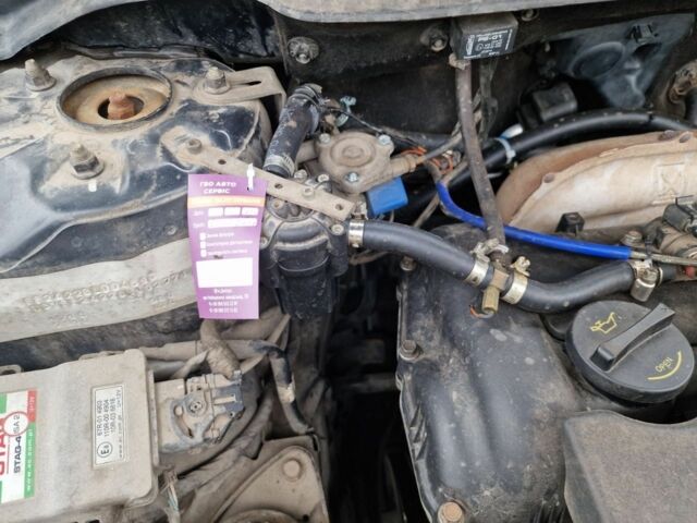 Чорний Кіа Сід, об'ємом двигуна 1.6 л та пробігом 203 тис. км за 6300 $, фото 5 на Automoto.ua