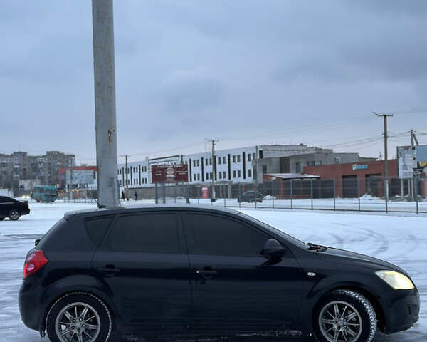 Чорний Кіа Сід, об'ємом двигуна 1.4 л та пробігом 240 тис. км за 4799 $, фото 5 на Automoto.ua