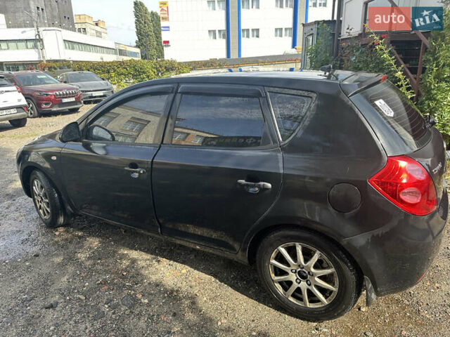 Черный Киа Сид, объемом двигателя 1.4 л и пробегом 277 тыс. км за 5100 $, фото 2 на Automoto.ua