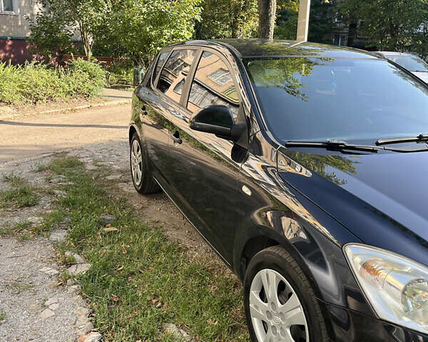 Чорний Кіа Сід, об'ємом двигуна 1.4 л та пробігом 175 тис. км за 6500 $, фото 1 на Automoto.ua