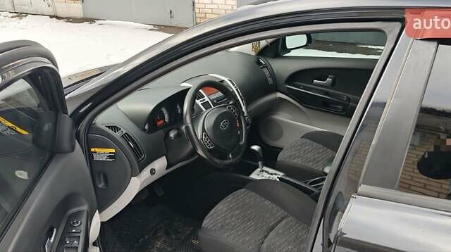 Чорний Кіа Сід, об'ємом двигуна 1.59 л та пробігом 264 тис. км за 6400 $, фото 5 на Automoto.ua