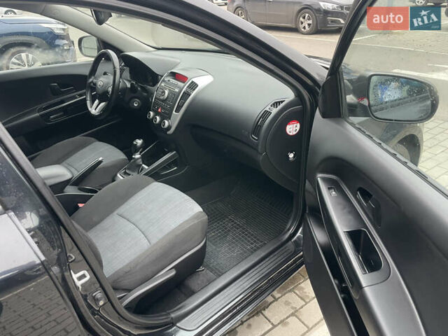 Чорний Кіа Сід, об'ємом двигуна 1.4 л та пробігом 156 тис. км за 5990 $, фото 6 на Automoto.ua