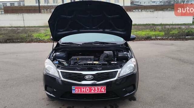 Черный Киа Сид, объемом двигателя 1.4 л и пробегом 215 тыс. км за 6000 $, фото 26 на Automoto.ua