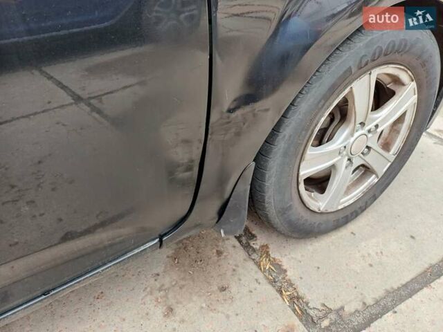 Черный Киа Сид, объемом двигателя 1.6 л и пробегом 330 тыс. км за 5800 $, фото 1 на Automoto.ua