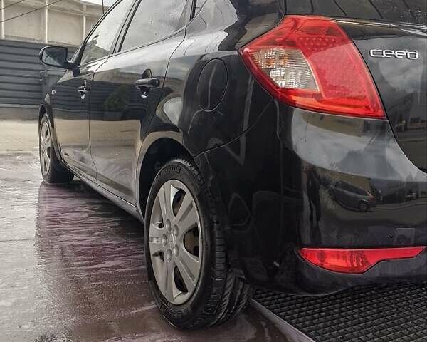 Черный Киа Сид, объемом двигателя 1.58 л и пробегом 239 тыс. км за 6100 $, фото 9 на Automoto.ua