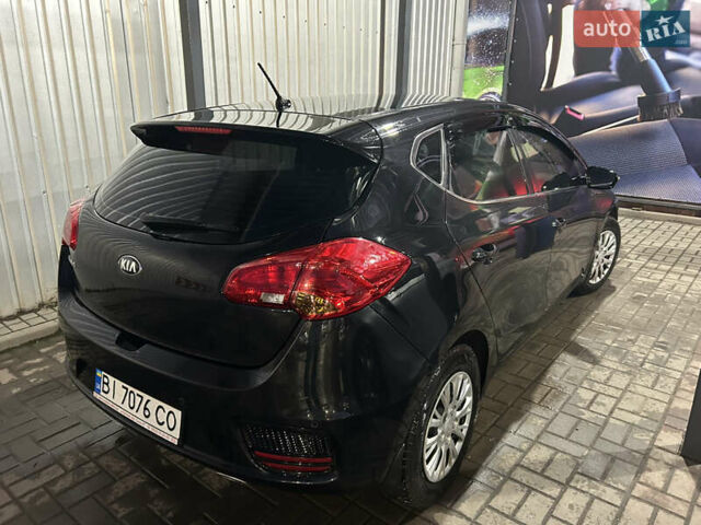 Черный Киа Сид, объемом двигателя 1.59 л и пробегом 52 тыс. км за 13700 $, фото 3 на Automoto.ua