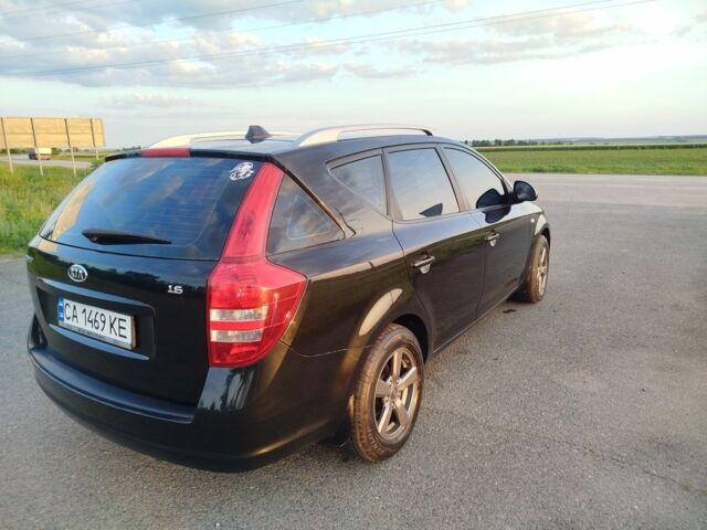 Черный Киа Сид, объемом двигателя 1.6 л и пробегом 200 тыс. км за 5499 $, фото 16 на Automoto.ua