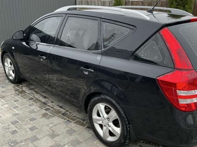 Чорний Кіа Сід, об'ємом двигуна 2 л та пробігом 225 тис. км за 6300 $, фото 1 на Automoto.ua