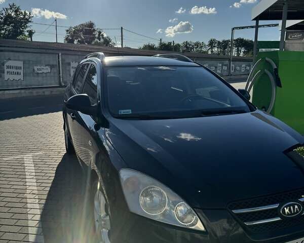 Черный Киа Сид, объемом двигателя 1.6 л и пробегом 300 тыс. км за 5800 $, фото 1 на Automoto.ua