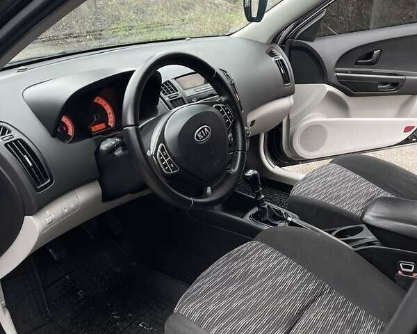 Черный Киа Сид, объемом двигателя 1.4 л и пробегом 194 тыс. км за 5600 $, фото 8 на Automoto.ua