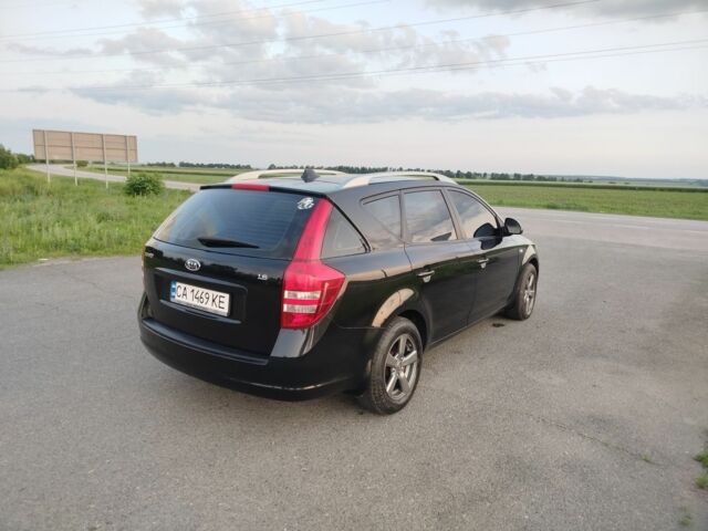 Черный Киа Сид, объемом двигателя 1.6 л и пробегом 200 тыс. км за 5499 $, фото 1 на Automoto.ua