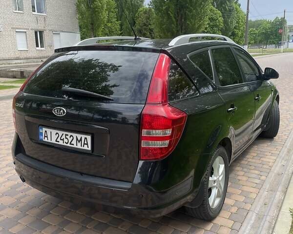 Черный Киа Сид, объемом двигателя 2 л и пробегом 245 тыс. км за 6200 $, фото 4 на Automoto.ua