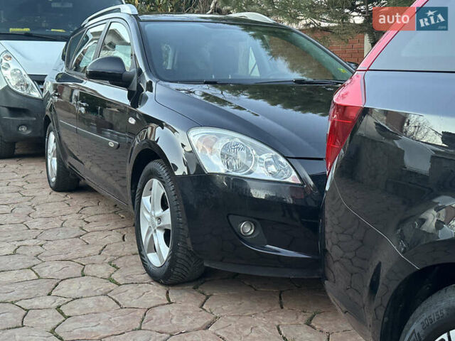 Чорний Кіа Сід, об'ємом двигуна 1.6 л та пробігом 203 тис. км за 6500 $, фото 15 на Automoto.ua