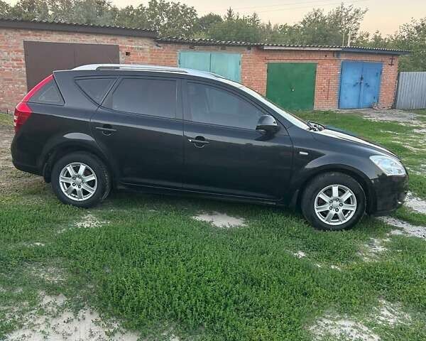 Чорний Кіа Сід, об'ємом двигуна 1.6 л та пробігом 155 тис. км за 5800 $, фото 6 на Automoto.ua