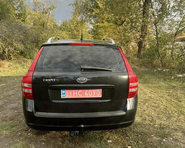 Кіа Сід 2008 у Новониколаевке на Automoto.ua Чорний Кіа Сід, об'ємом двигуна 1.6 л та пробігом 214 тис. км за 5400 $, фото 4 на Automoto.ua