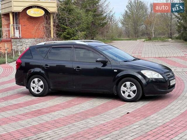 Чорний Кіа Сід, об'ємом двигуна 1.6 л та пробігом 218 тис. км за 5999 $, фото 3 на Automoto.ua