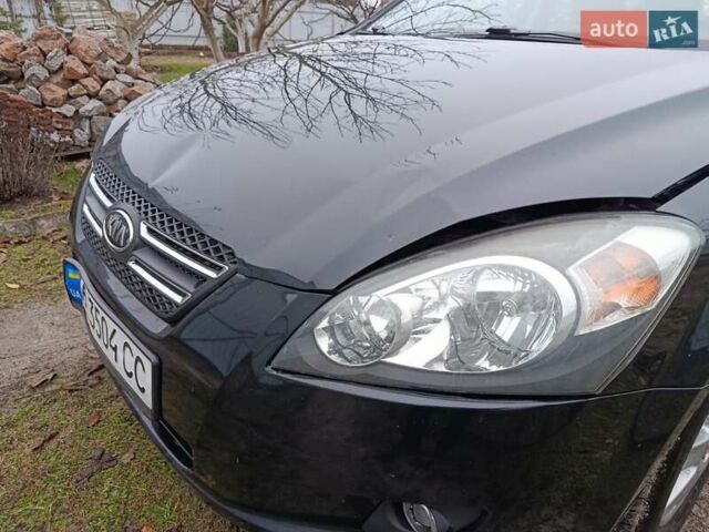 Черный Киа Сид, объемом двигателя 2 л и пробегом 251 тыс. км за 3500 $, фото 27 на Automoto.ua