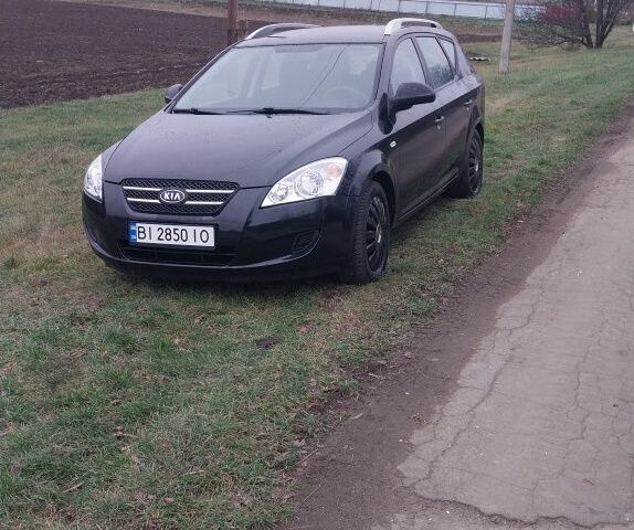 Чорний Кіа Сід, об'ємом двигуна 1.4 л та пробігом 230 тис. км за 5550 $, фото 4 на Automoto.ua